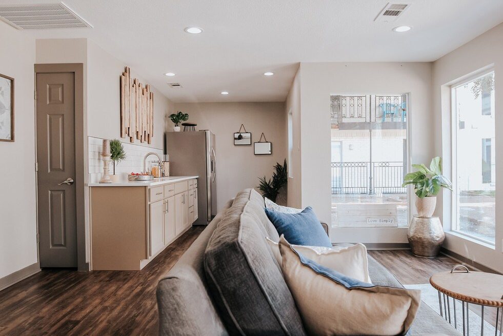 Updated kitchen with white cabinetry at 1540 Apartments